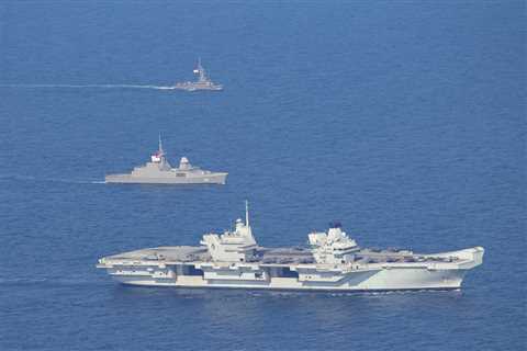 British strike group and aircraft carrier visit Singapore